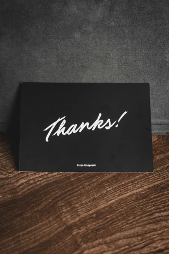 a thank card that has some writing on it