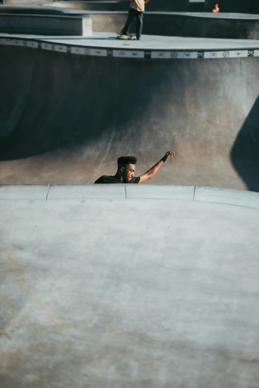 a person riding a skateboard at a skate park