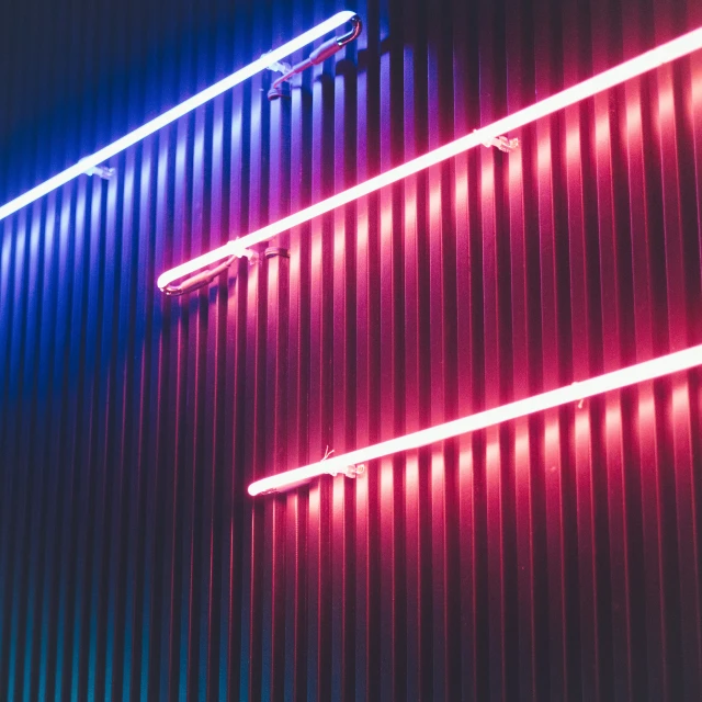 bright red and blue lights on a wall
