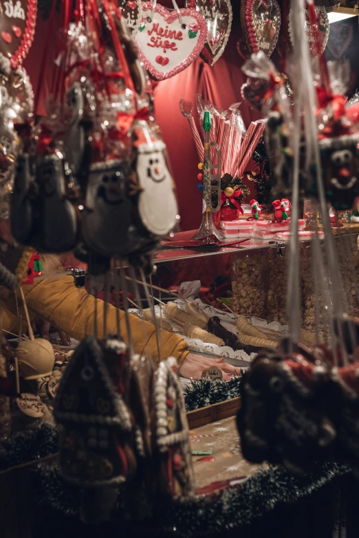 a shop is filled with christmas decorations and candy