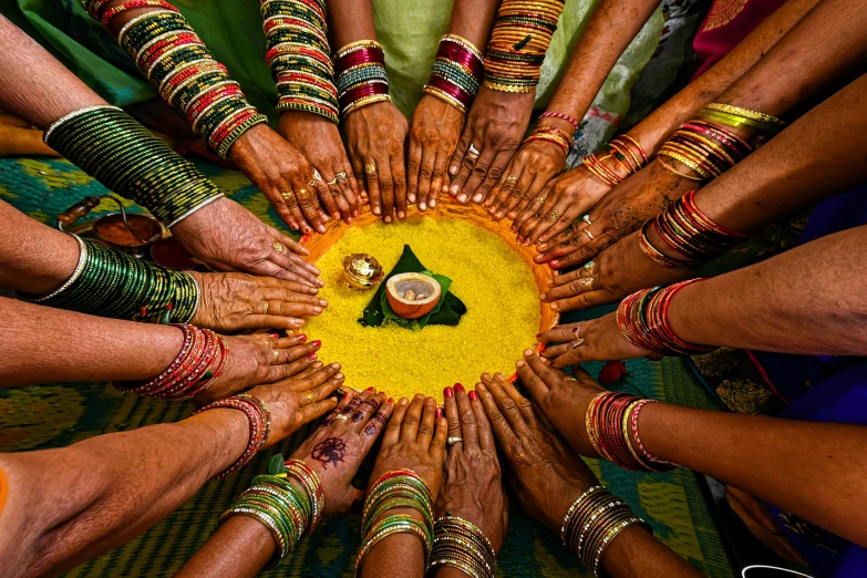 a group of people sitting in a circle together