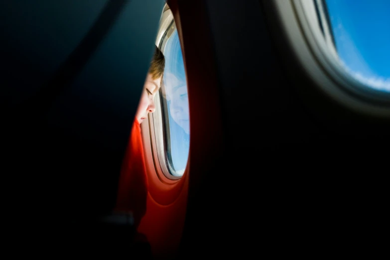 the inside of an airplane looking out of the window