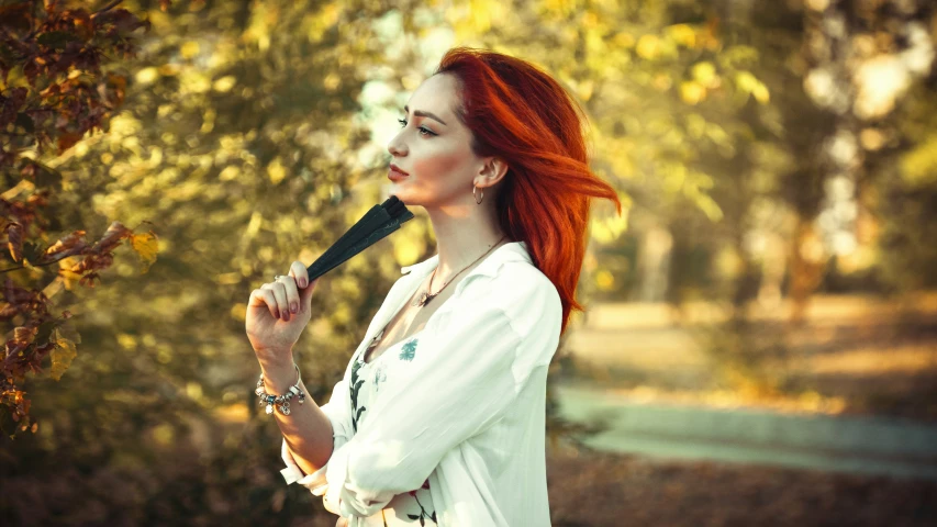 a woman holding a baseball bat in her hands