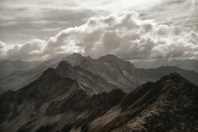 an expanse of mountains that appear to be a lake with water