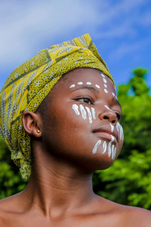 a person with a white painted face