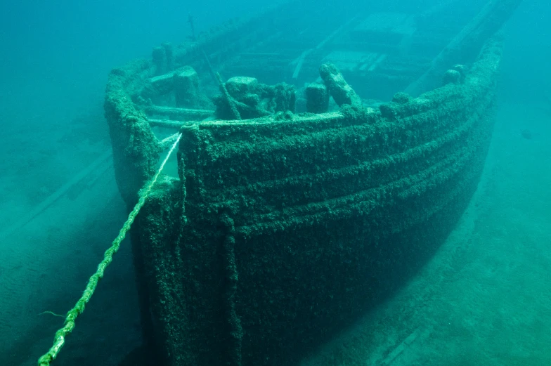 an underwater view of a ship in the water