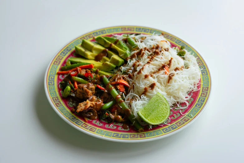 the plate is filled with various ingredients including rice, beans and broccoli