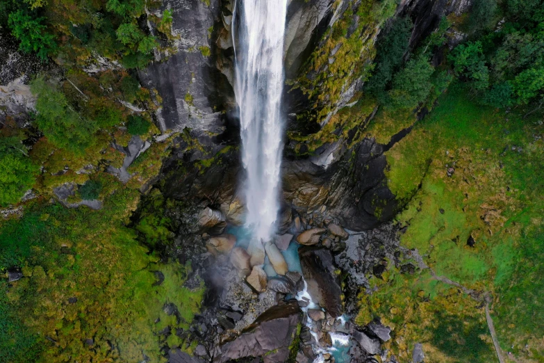 an aerial view of a very pretty waterfall