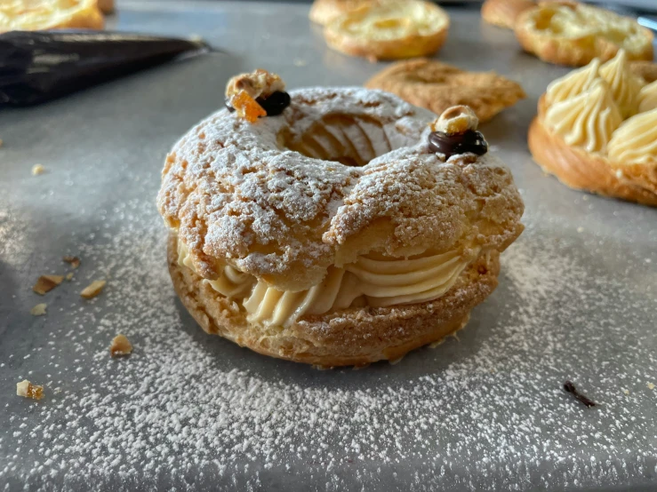 several pastries and pastry products on a baking tray