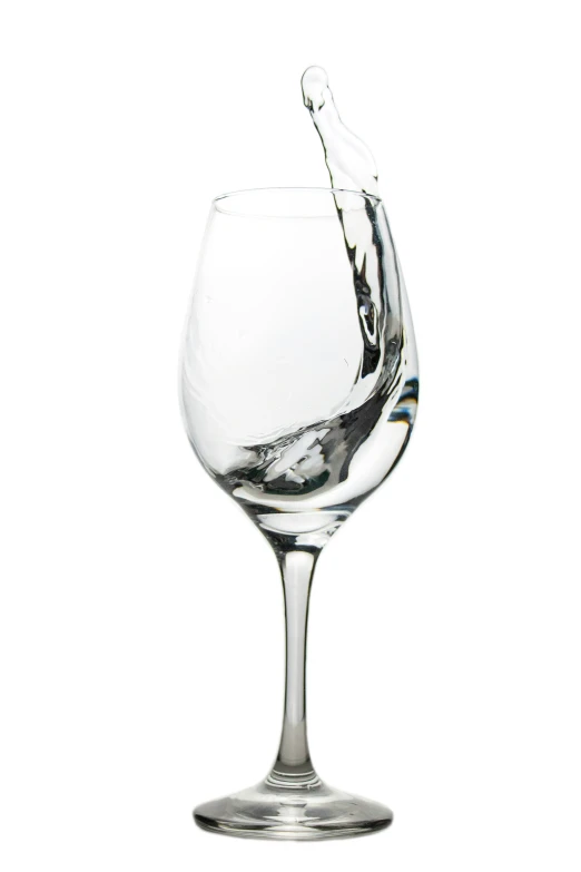 a glass with water being poured in it