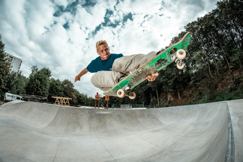 a man that is jumping with a skateboard