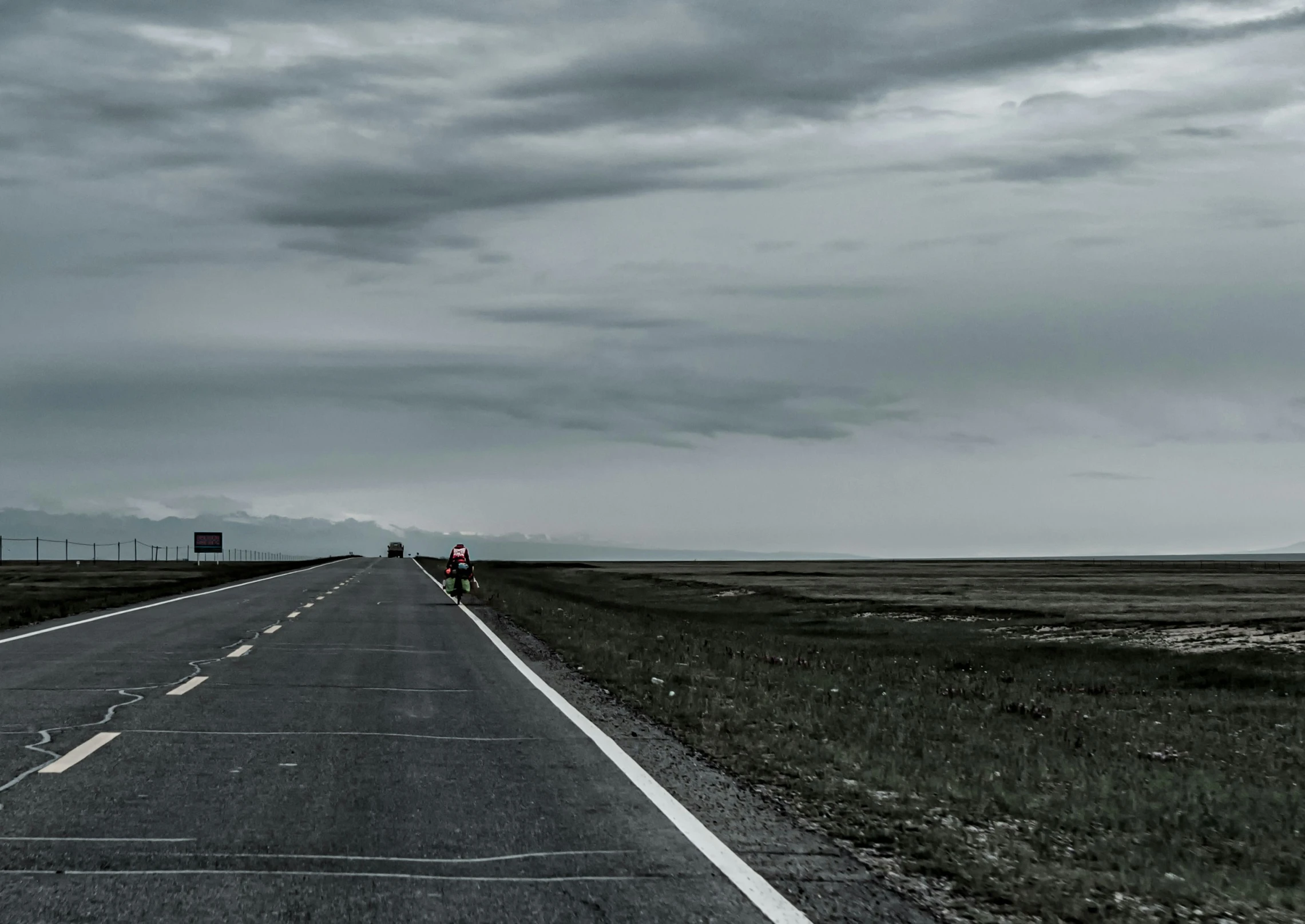 two men on motorcycles on the road