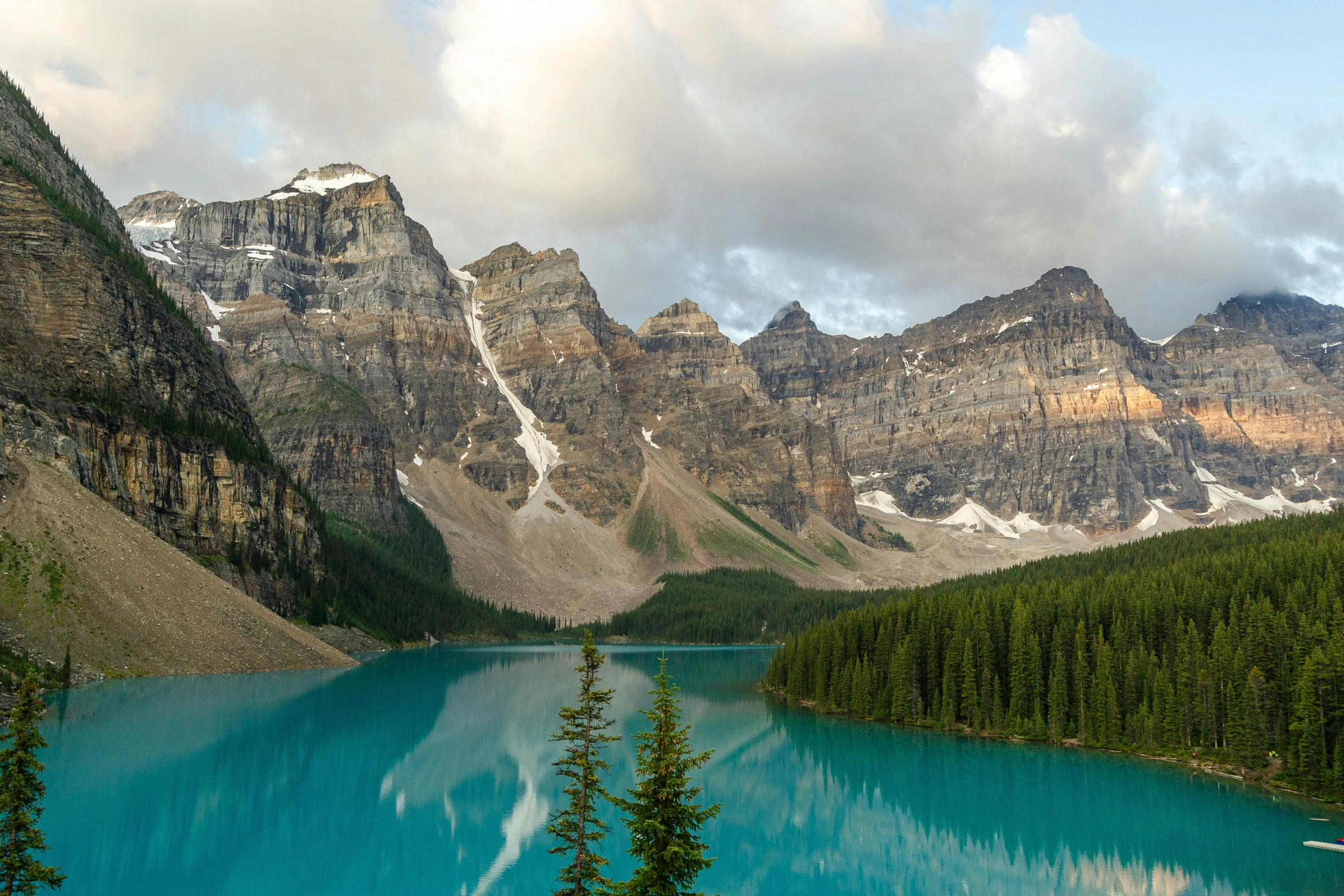 a large river surrounded by mountains filled with water