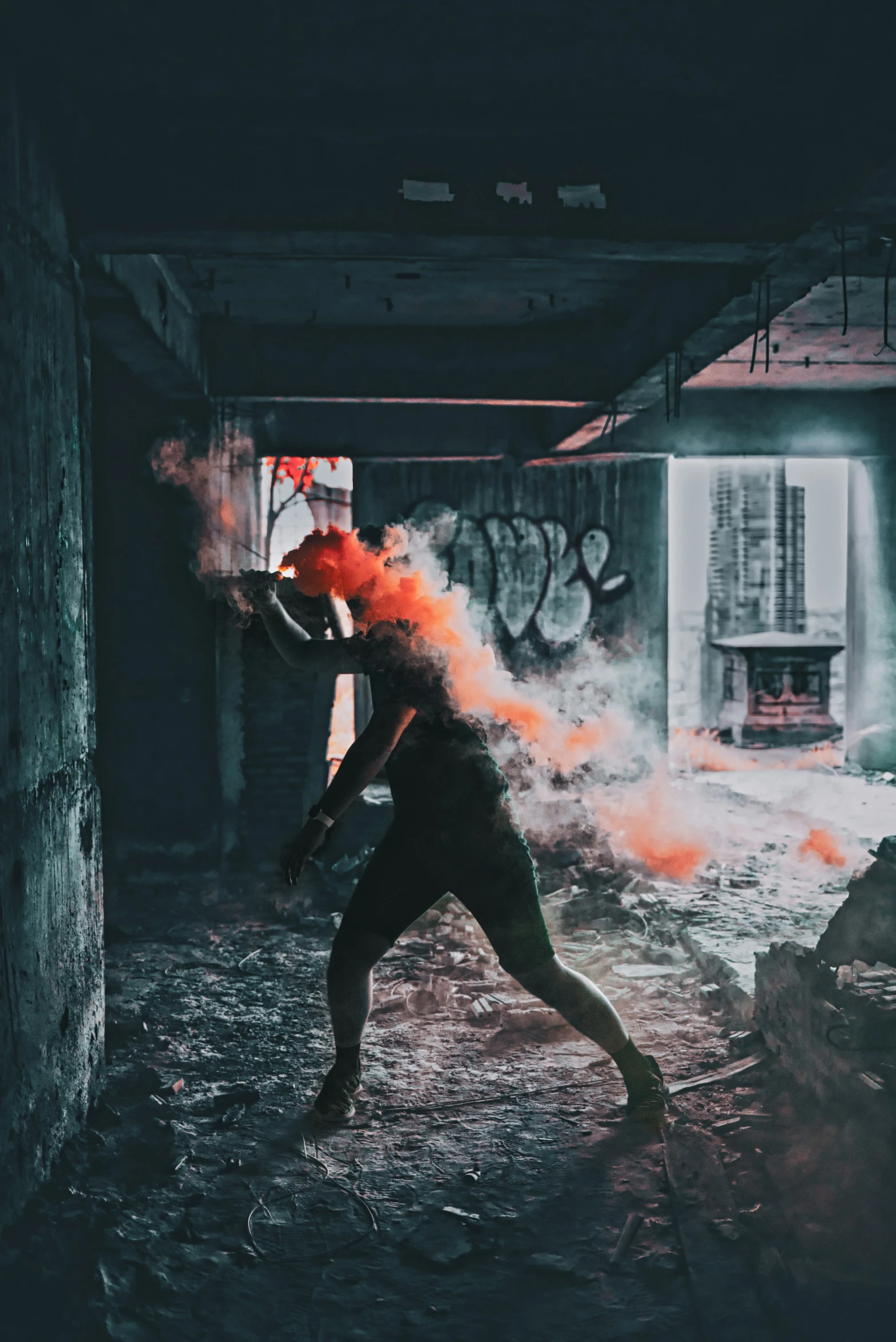 person with orange and black smoke throwing a disc