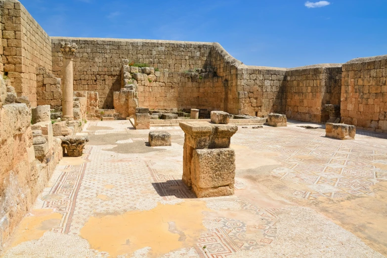 a group of very old stones in an open space