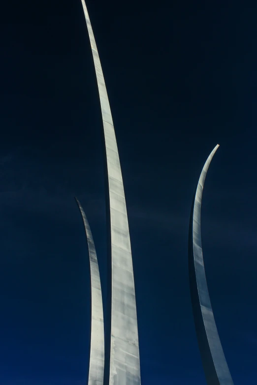 some very long white spires against the sky