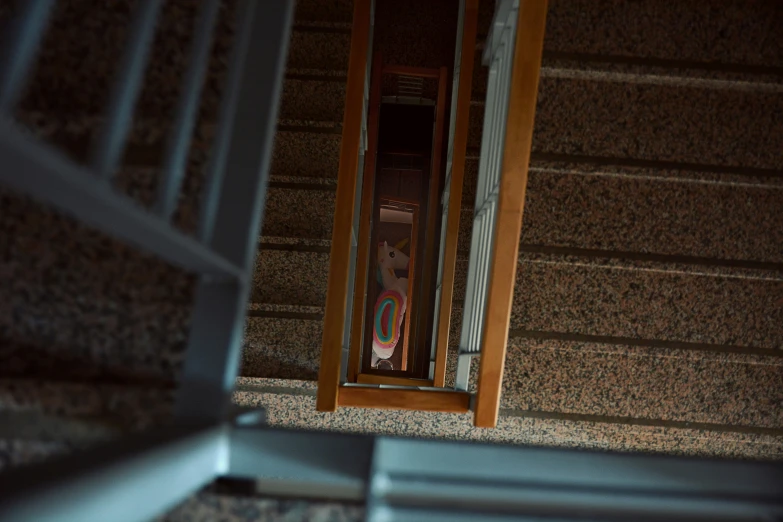 a staircase leading up to another room from a building