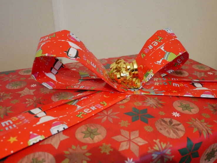 presents wrapped in wrapping paper with golden foil