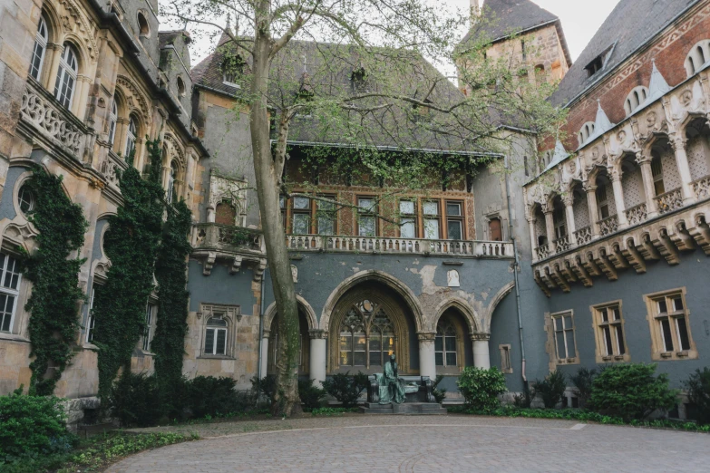 the front of a building with a green door