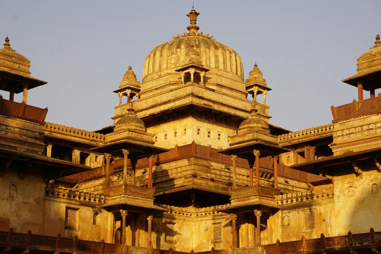 a po of an ornate building with large domes