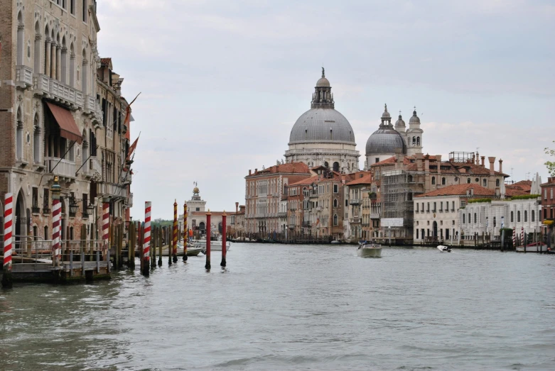 the river view of venice with old buildings along side it