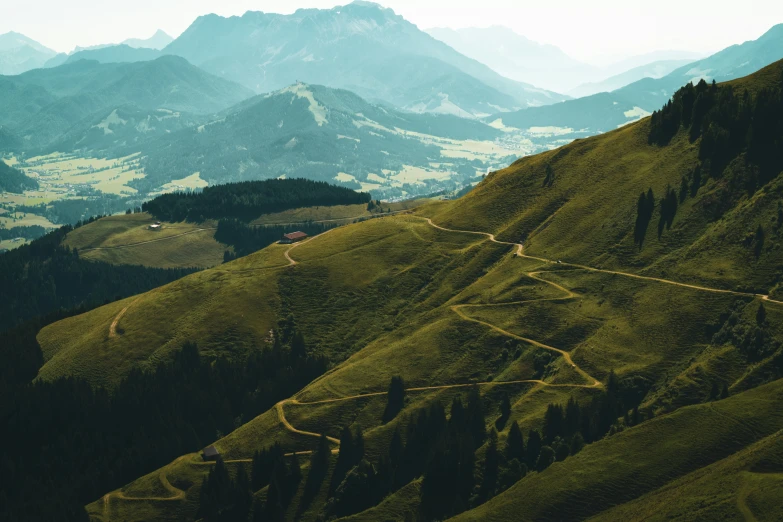 a view of some very high mountains with an arrow pointing to soing