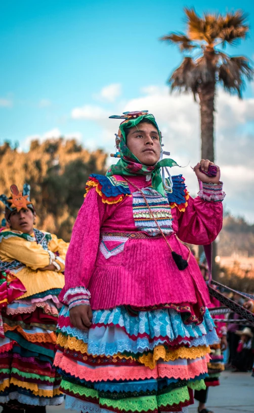 three people in costumes stand near each other