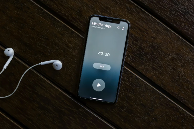 a phone is connected to some type of headphones