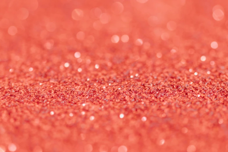 a close up of the red glitter