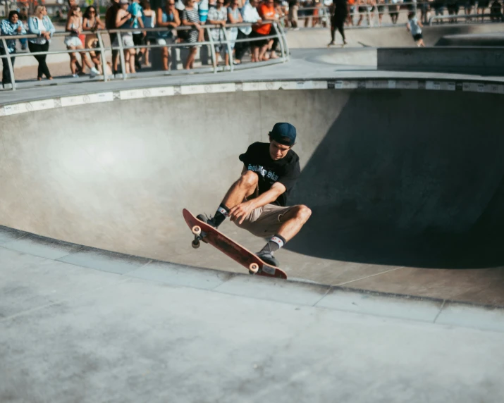 a man riding a skateboard into the air