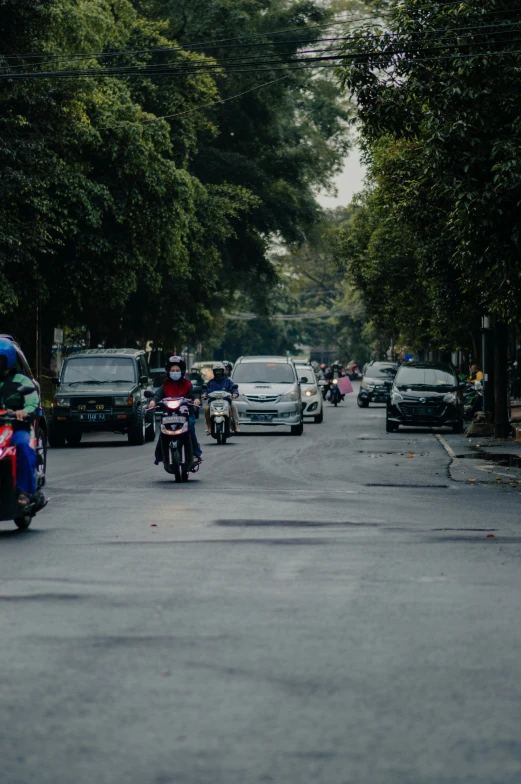 there is a motor bike in the middle of a street