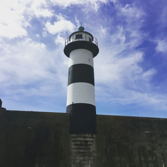 a big light house that has a very tall structure