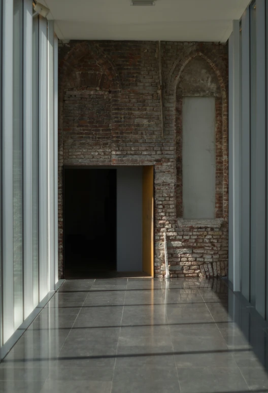 an empty room is displayed with doors open