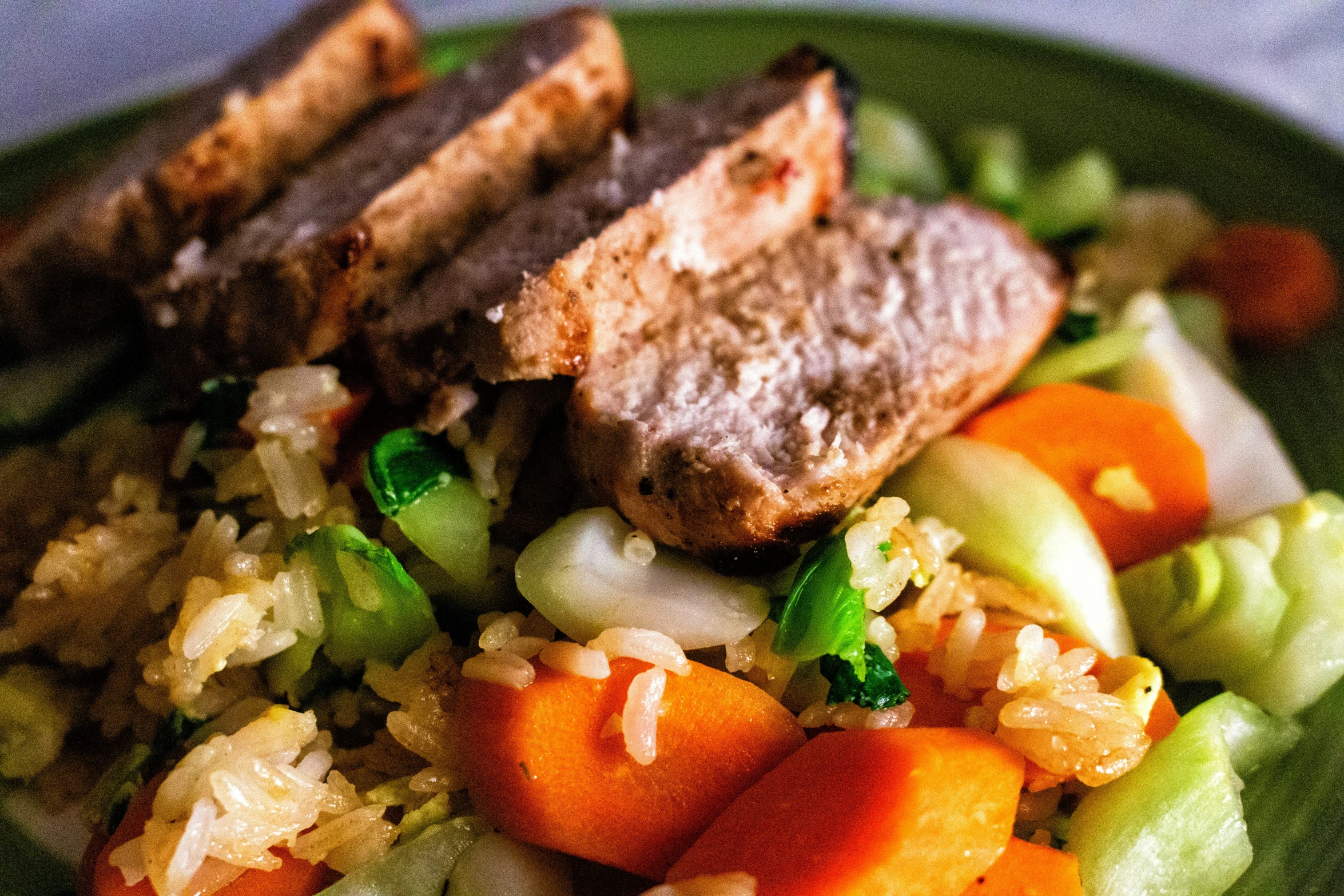 a plate full of food is sitting on the table