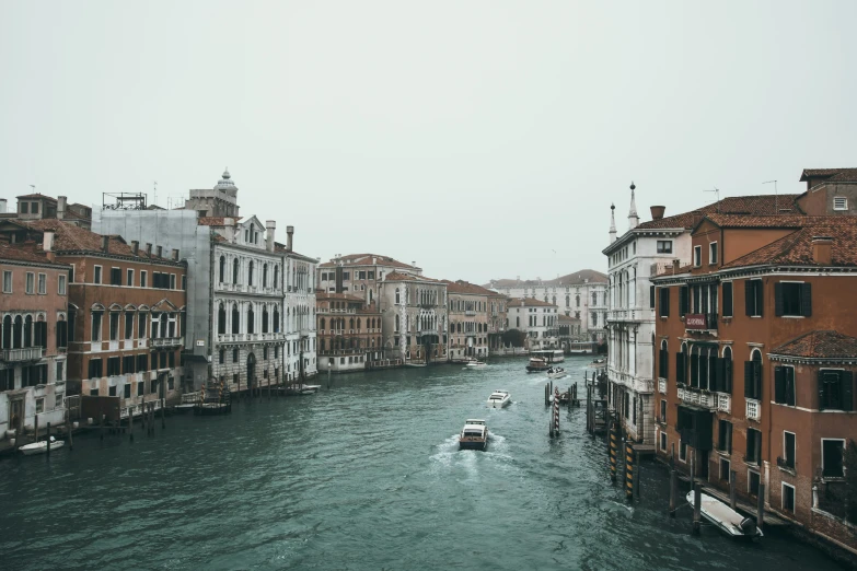 the view down a river lined with buildings