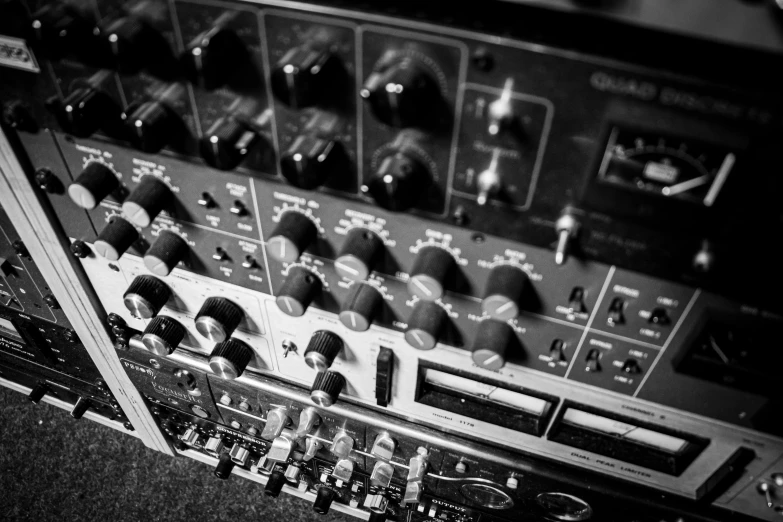 a very large sound mixing console sitting on top of a table