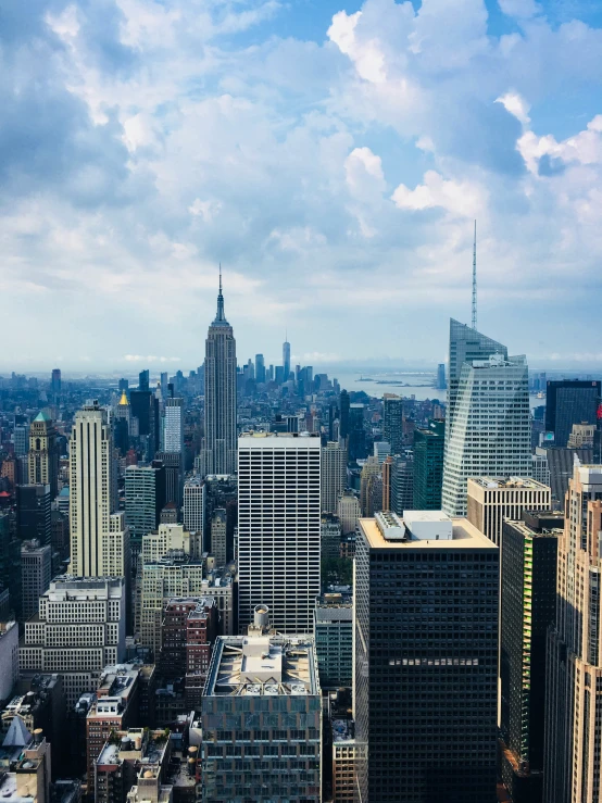 large city buildings with sky in the background