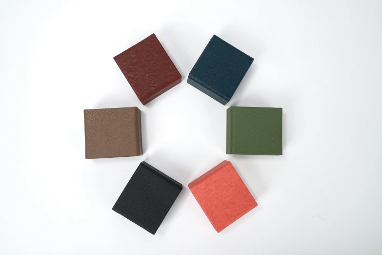 several small colored squares sitting in a circle