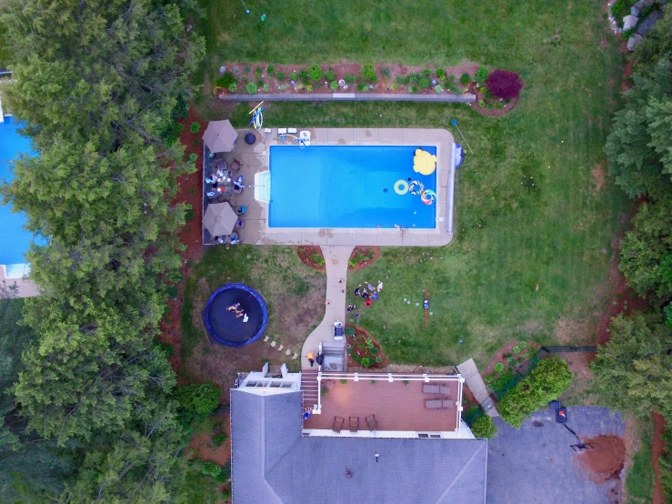 a home with a swimming pool in the middle
