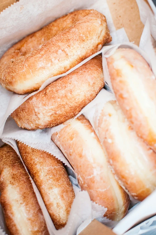 bread cut into eight pieces on top of a piece of paper