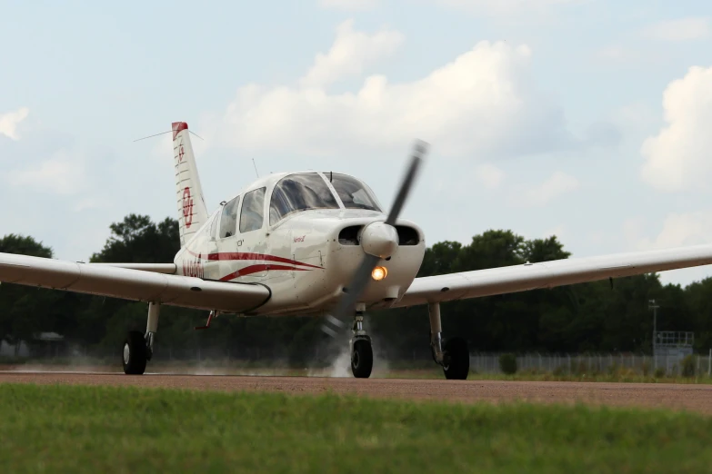 an airplane is shown about to land on the runway