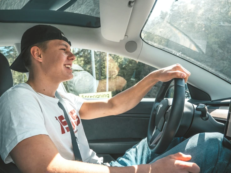 an image of a man driving his car