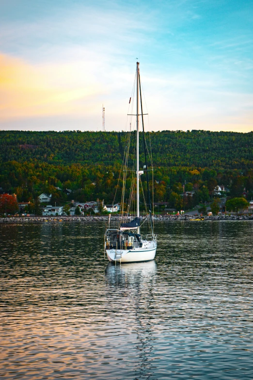 a boat floating on top of a body of water