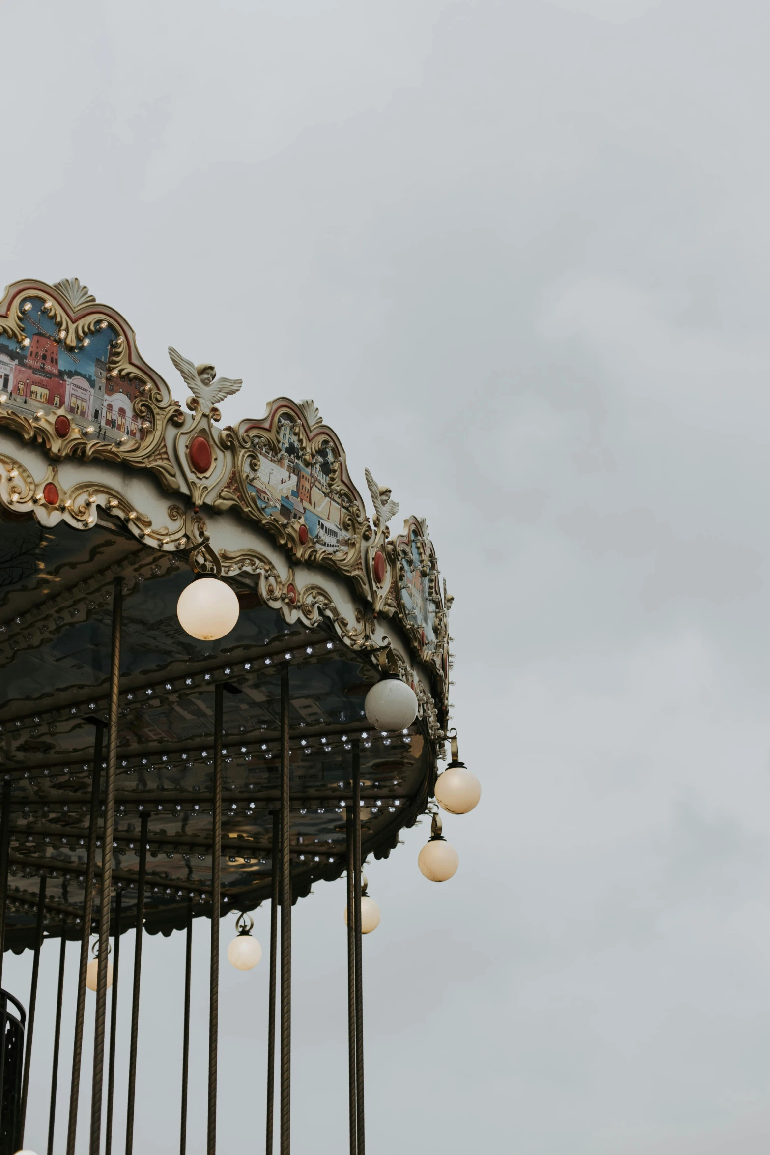 a carousel that has many lights on the side of it