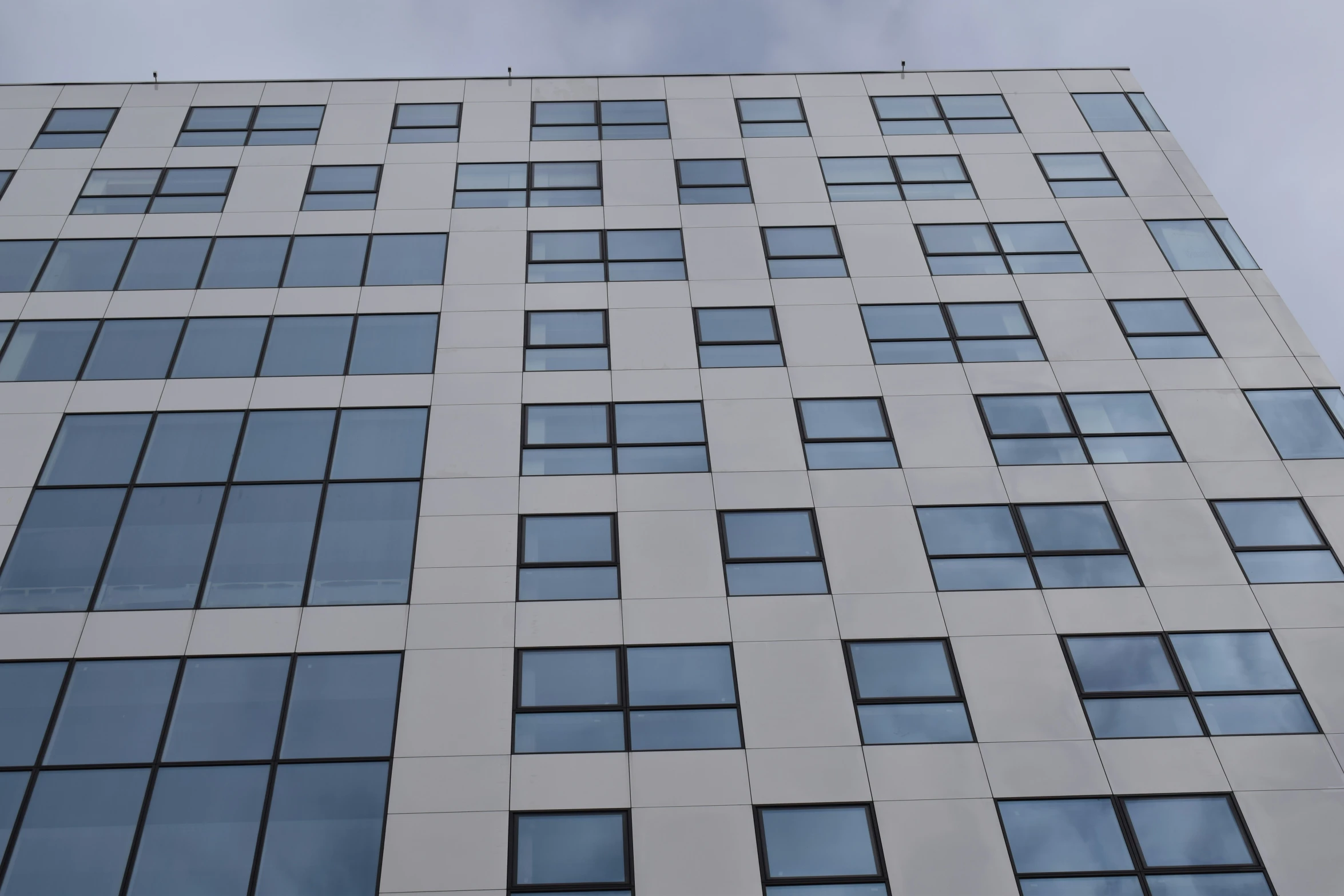 some windows that are in the side of a building