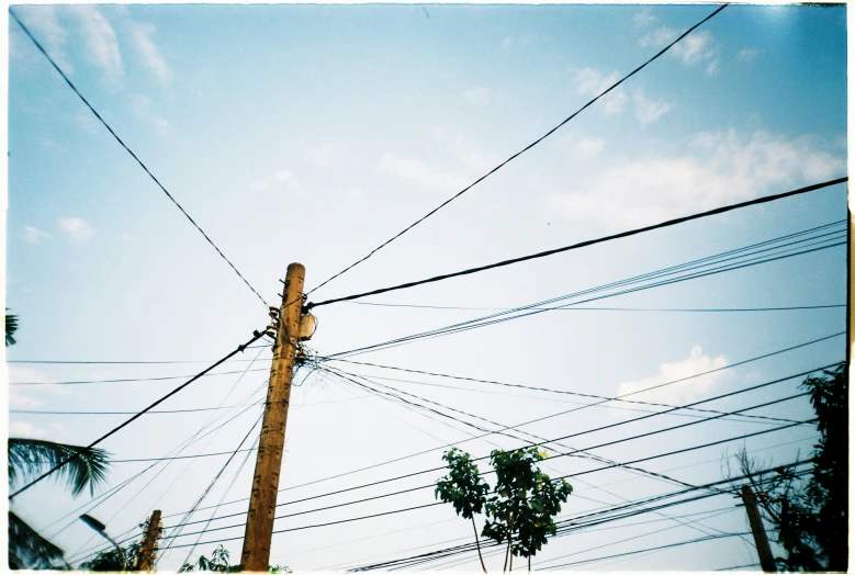 two poles are connected to one another in the middle of an empty street