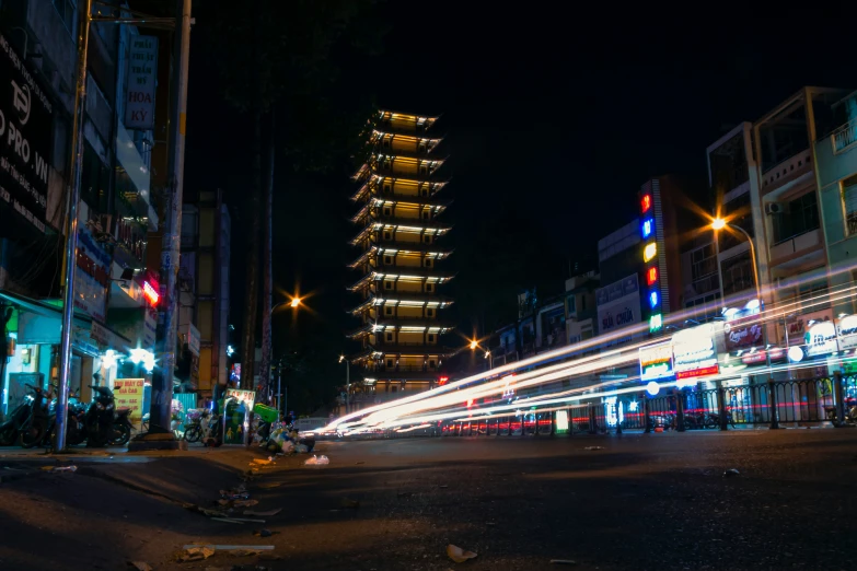 there are many lights shining down this street