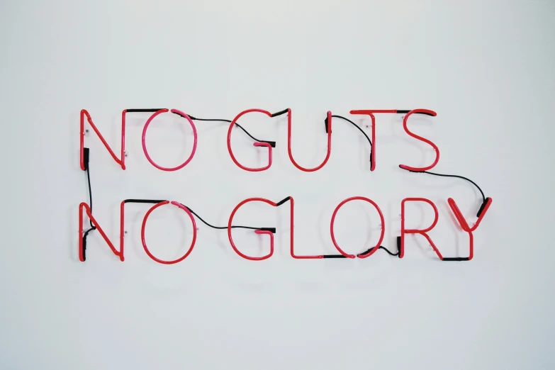 the words no  no glory appear to be made of neon red wires