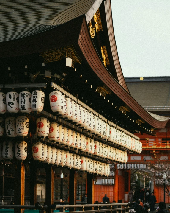 a large building with lots of white vases on it