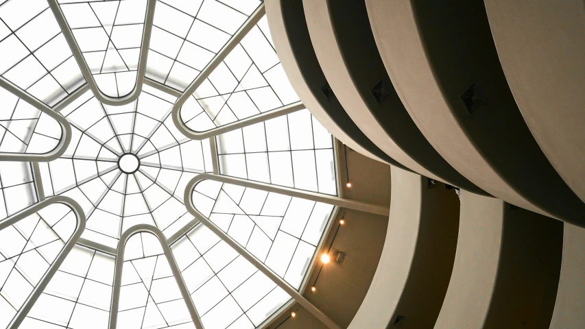 an intricately designed ceiling in a large building